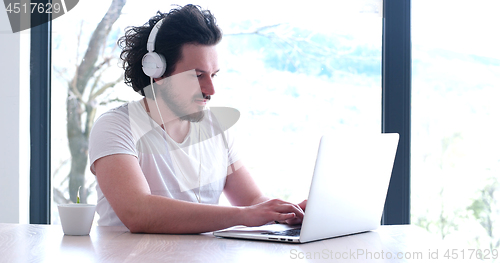 Image of man drinking coffee enjoying relaxing lifestyle