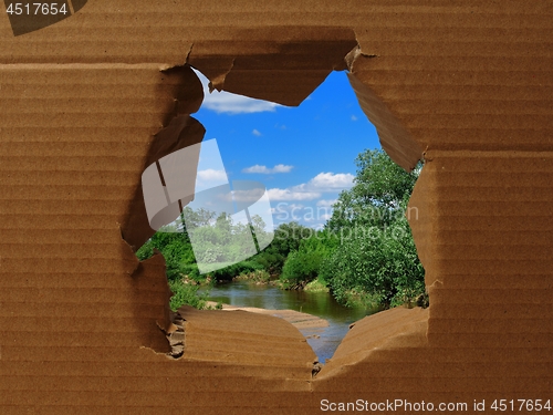 Image of Hole in cardboard