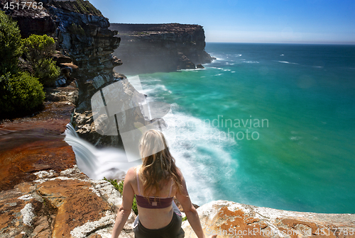 Image of Watching waterfalls flow into the ocean