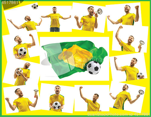 Image of Brazilian fan celebrating on white background. The young man in soccer football uniform with ball standing at white studio. Fan, support concept. Human emotions concept.