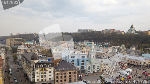 Image of KIEV, UKRAINE - April 19, 2018: people and outdoor market on Kontraktova Square in Kiev city in spring.