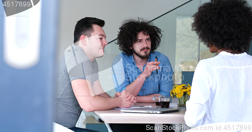 Image of Multiethnic startup business team on meeting