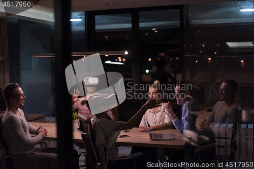 Image of Multiethnic Business team using virtual reality headset