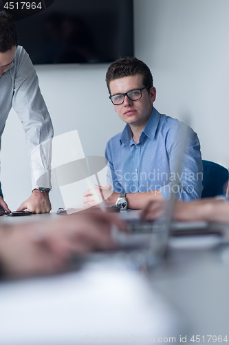 Image of Group of young people meeting in startup office