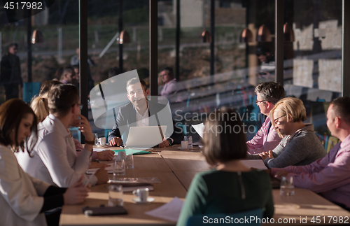 Image of Business Team At A Meeting at modern office building