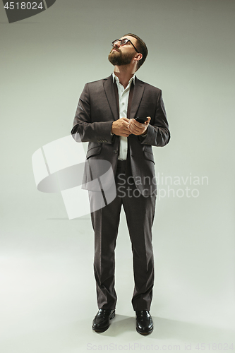 Image of Handsome businessman with mobile phone