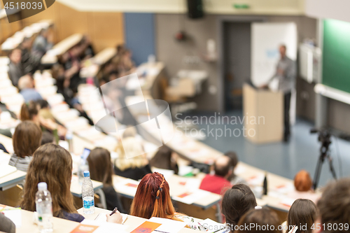 Image of Expert speaker giving a talk at scientific business conference event.