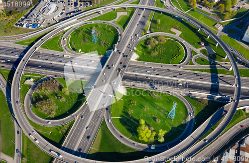 Image of Aerial view of a freeway intersection traffic trails in Moscow.