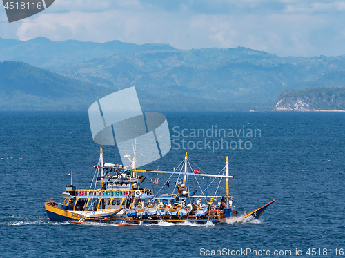 Image of Outrigger fishing boat in the Philippines