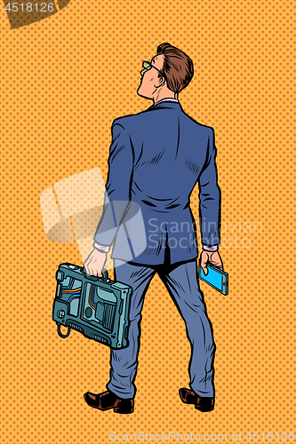 Image of businessman with briefcase and phone