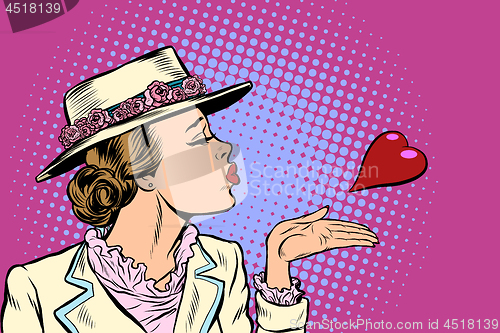 Image of retro woman blowing a kiss