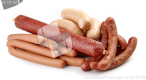 Image of various sausages on white background