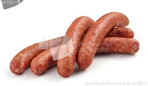 Image of smoked sausages on white background