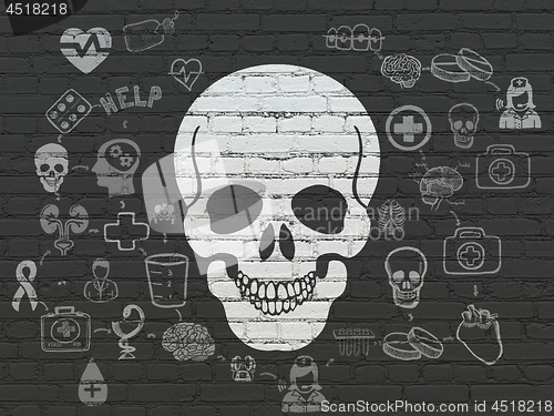 Image of Health concept: Scull on wall background