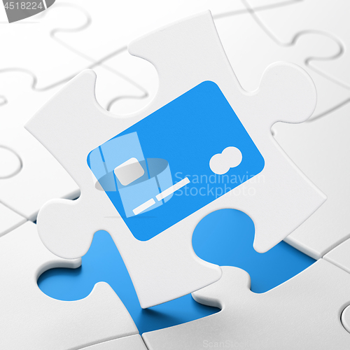 Image of Business concept: Credit Card on puzzle background