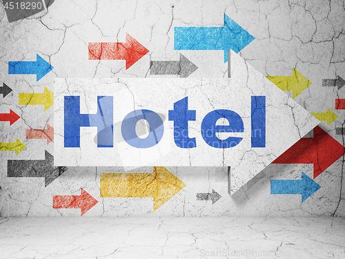 Image of Tourism concept: arrow with Hotel on grunge wall background