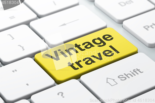 Image of Travel concept: Vintage Travel on computer keyboard background