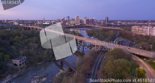 Image of Evening Light Over Highways Heading Downtown City Skyline Riverf