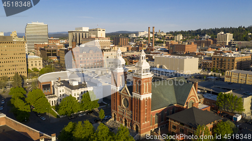 Image of Historic buildings at the forefront in the downtown urban area o