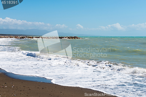 Image of Beautiful sea and the black sandy beach,