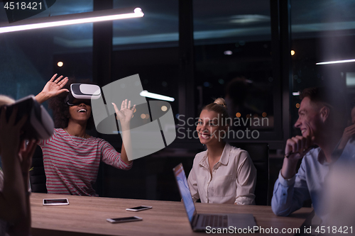 Image of Multiethnic Business team using virtual reality headset