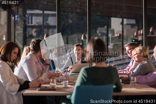 Image of Business Team At A Meeting at modern office building