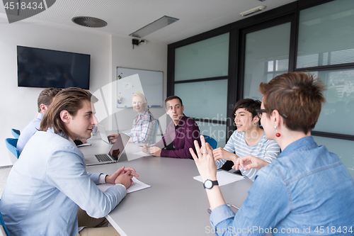 Image of Business Team At A Meeting at modern office building