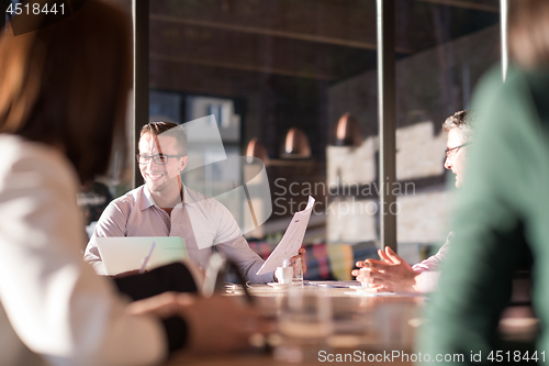 Image of Business Team At A Meeting at modern office building