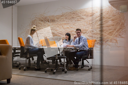 Image of Business Team At A Meeting at modern office building