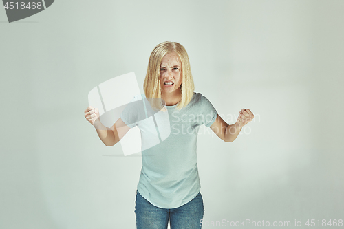 Image of Portrait of an angry woman looking at camera