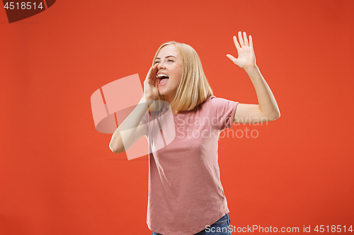 Image of A portrait of surprised screaming woman