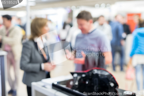 Image of Blured image of businesspeople socializing and networking at business and entrepreneurship meeting.