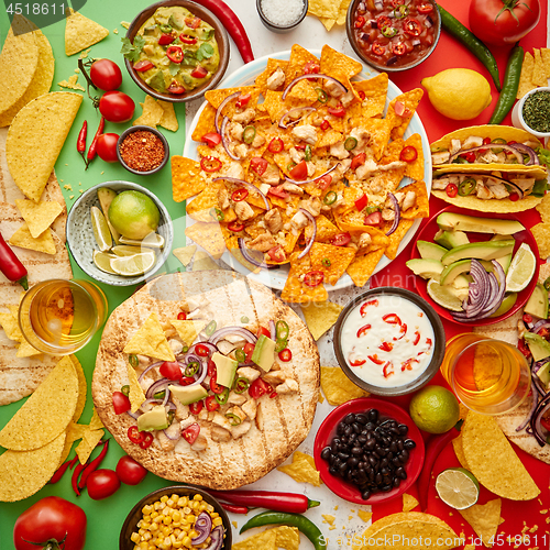 Image of An overhead photo of an assortment of many different Mexican foods on a table