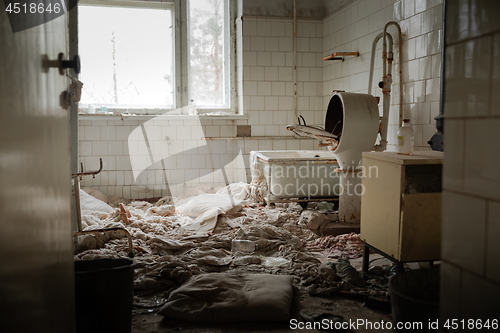 Image of Old laundry room of abandoned hospital