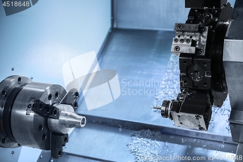 Image of Automated robotic drill working in industrial factory