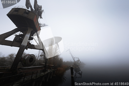 Image of Rusty old industrial dock cranes at Chernobyl Dock, 2019