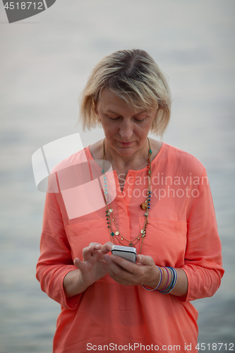 Image of A lady in coral