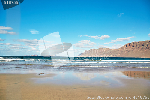 Image of Landscape with volcanic hills and atlantic ocean in Lanzarote 