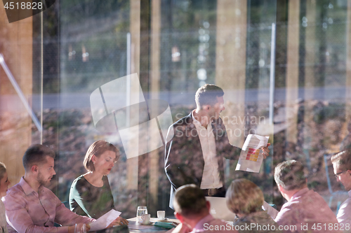 Image of Business Team At A Meeting at modern office building