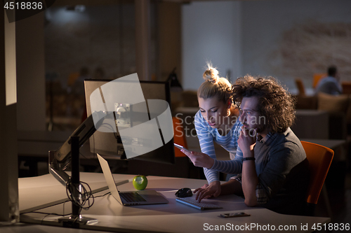 Image of young designers in the night office