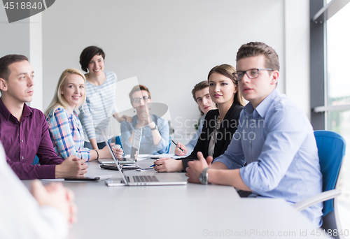 Image of Business Team At A Meeting at modern office building