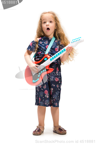 Image of Smiling cute toddler girl three years singing over white background