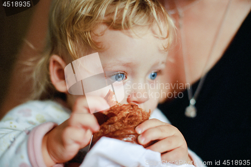 Image of Blue eyes of a croissant eater