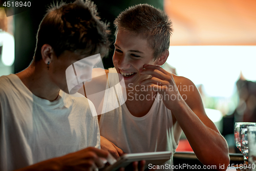 Image of Young boys in a cafe