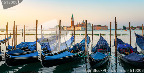 Image of Moored Gondolas at venetian sunrise