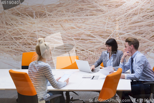 Image of Business Team At A Meeting at modern office building