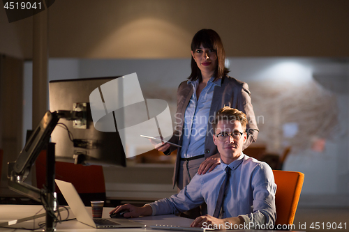 Image of young designers in the night office