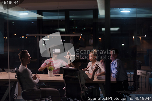 Image of Multiethnic Business team using virtual reality headset