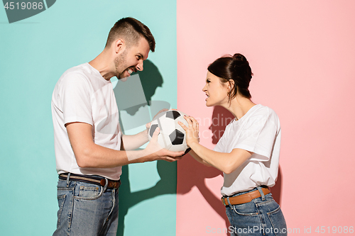 Image of The unhappy and angry fans on colored blue and pink background.