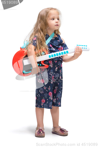 Image of Smiling cute toddler girl three years singing over white background